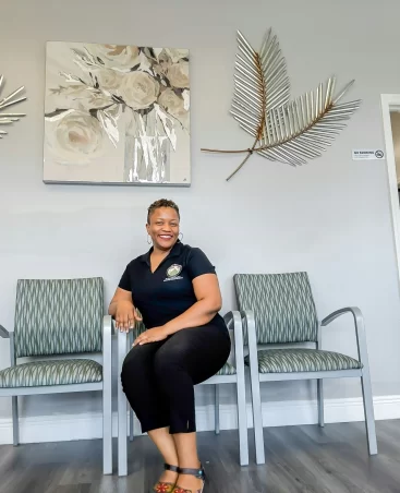 Bright reception nook with modern chairs and reading wall